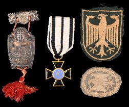 A 1903 German Nuremberg athletics festival medallion together with a replica Prussian Order of