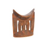 An African carved wooden head rest of the Kambatta people of Ethiopia, 18 cm x 19 cm
