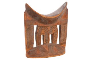 An African carved wooden head rest of the Kambatta people of Ethiopia, 18 cm x 19 cm