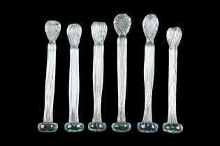 A set of six glass cocktail stirrers, 11 cm