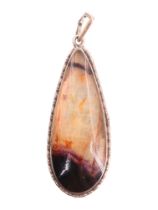 A contemporary Derbyshire Blue John teardrop shaped pendant, the polished mineral set in white
