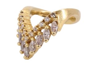 A striking diamond and 18 ct gold dress ring, comprising a chevron of claw-set diamond brilliants