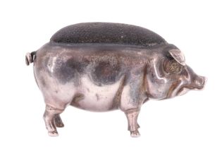 An Edwardian silver novelty pin cushion in the form of a pig, Sloane & Carter, Birmingham, 1906,