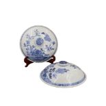 A pair of 19th Century Chinese export porcelain blue and white covers, having a garden with a