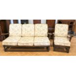 An Ercol two piece suite, [sold with covers for use as patterns only]