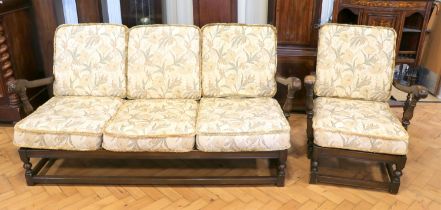 An Ercol two piece suite, [sold with covers for use as patterns only]