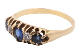A mid-to-late 20th Century sapphire and diamond ring, having a 4 x 3 mm oval set between two 3 mm