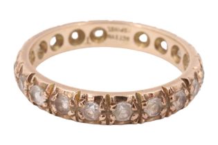 A late 20th Century white spinel eternity ring, set with 20 2 mm brilliants in a 9 ct yellow metal