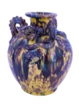 A Chinese Sancai glazed earthenware / stoneware dragon vase, of ovoid form with short flared neck,