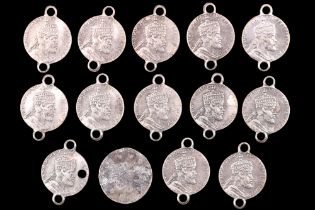A group of miniature Ethiopian Menelik II commemorative coins