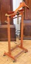 An Italian gentleman's brass mounted timber clothes valet stand, by FR Italy, circa 1960s