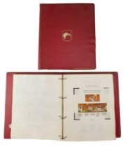 Two Stanley Gibbons stamp albums, "The Commonwealth of Australia" and "New Zealand", containing