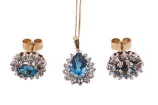 A late 20th Century blue topaz and goshenite demi-parure, comprising a pair of stud earrings each