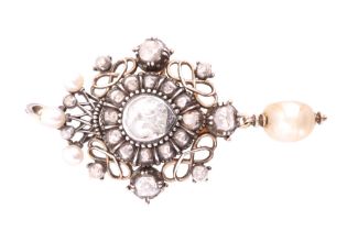 A Georgian diamond and pearl pendant / brooch, comprising a central old cut diamond of approx 1.4