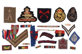 Sundry items of military cloth insignia, medal ribbons and badges