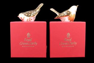 Two Royal Crown Derby bird paperweights, 'Aura', both having gold stoppers and boxed, tallest 7.5