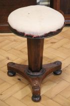 A George IV brass mounted mahogany piano stool