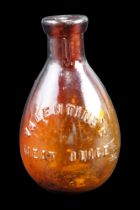 A late 19th Century Valentine's Meat Juice glass bottle, 8 cm [In 1870 Mann S. Valentine's wife Anne