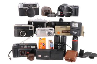 A group of vintage cameras including a Yashica Lynx-1000, an Agfa Isolette, a Kodak 'Instamatic',