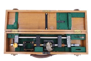 A cased British army JMG & Sons Ltd Bar-Parallax attachment for a photogrammetric stereoscope, circa