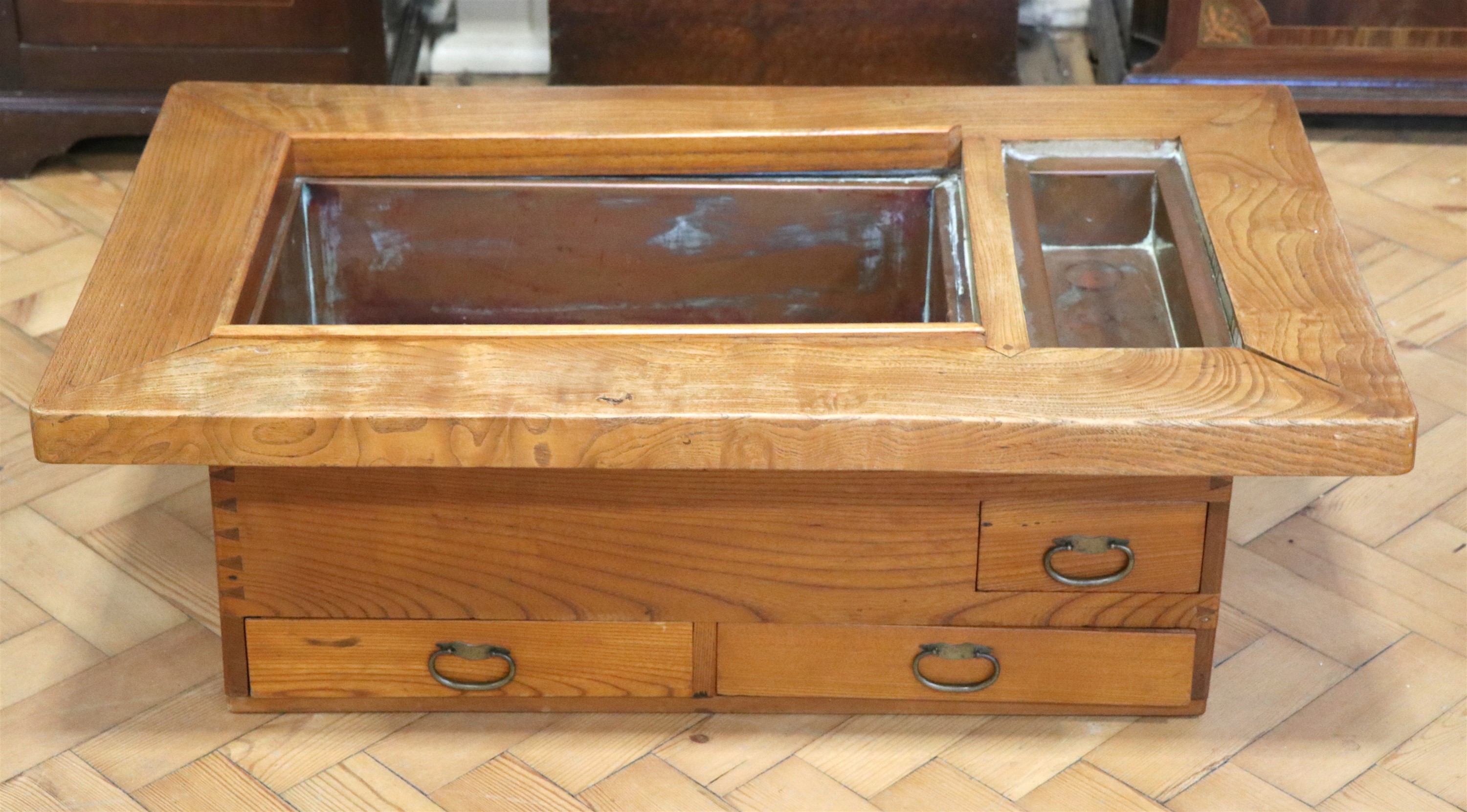 A Japanese copper lined ash Naga-hibachi ( brazier ) table, 88 x 53 x 30 cm