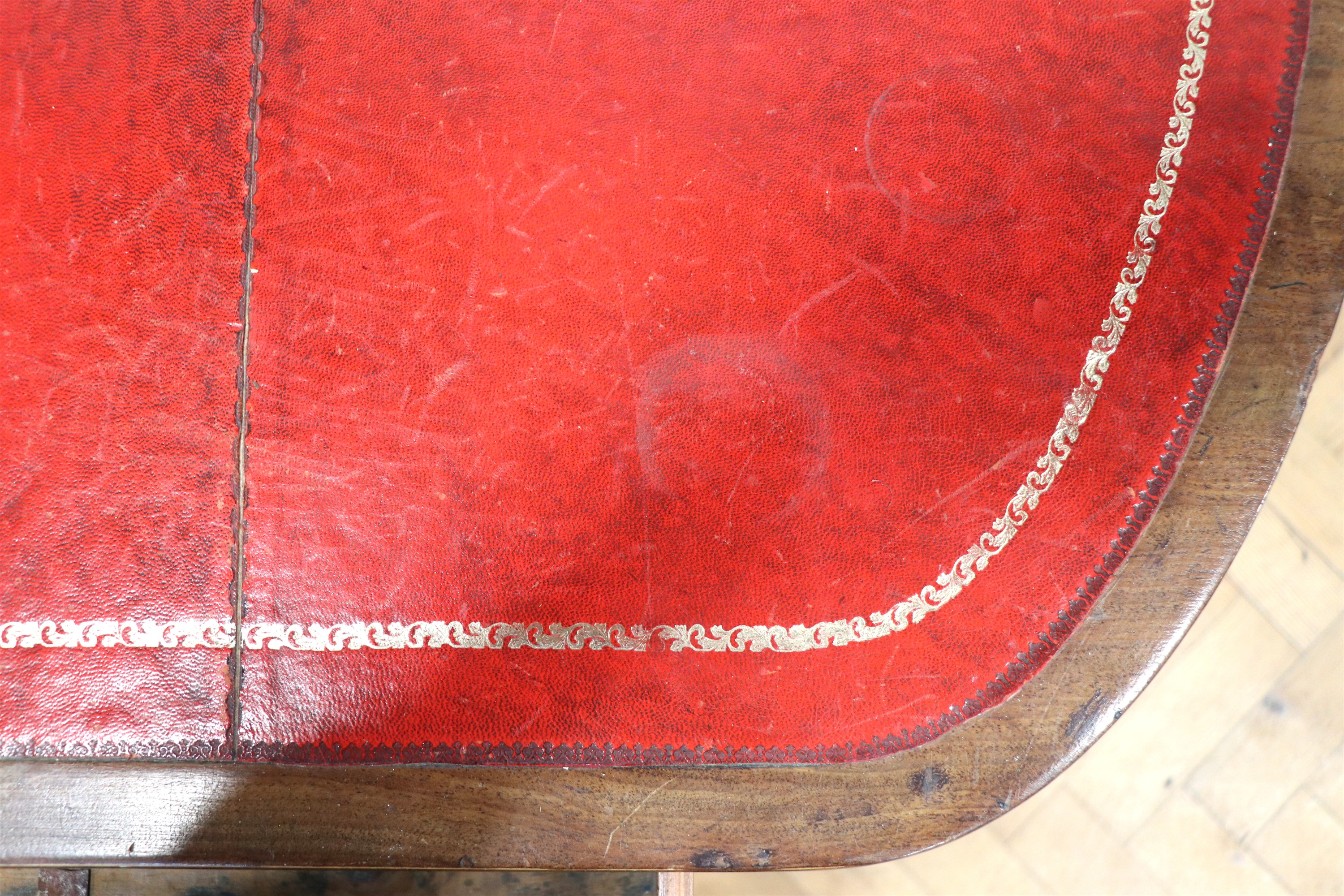 A Georgian mahogany writing table, having a rounded oblong top with a gilt tooled red leather - Image 3 of 4