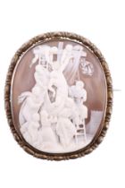 A 19th Century Italian shell cameo depiction of Christ's Descent from the Cross, in silver-gilt