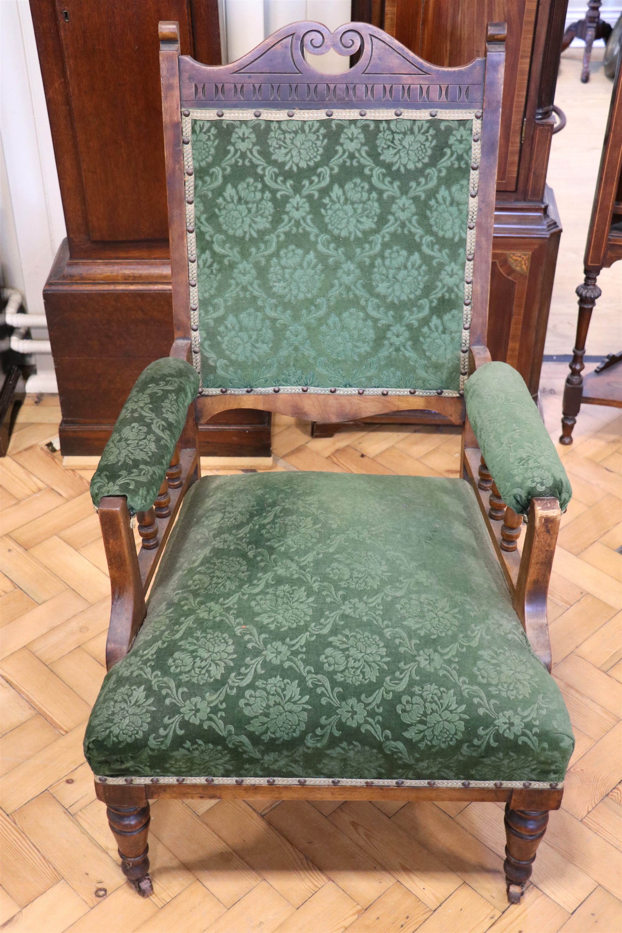 A Victorian upholstered and carved open-arm lounge chair - Image 2 of 2