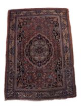 A Persian Kashan hand-knotted silk blend rug, 182 cm x 132 cm