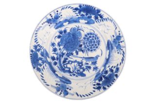 A Kangxi Chinese export blue-and-white porcelain plate, decorated in depiction of a bird within