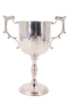 A late 19th / early 20th Century silver-plated trophy cup, having compound scroll handles, by Robert