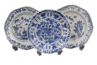 A Kangxi Chinese export blue-and-white plate, having a centrally reserved floral panel, the
