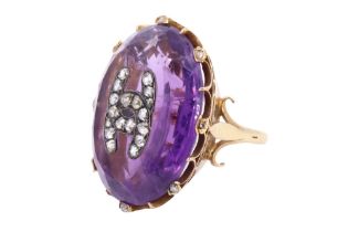 [ Channel ] A striking Belle Epoque amethyst and diamond dress ring, comprising a large oval cut