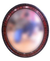 A George V oval wall mirror, 59 x 49 cm