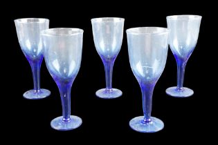 Five late 20th Century Bristol-blue wine glasses, of elongated trumpet form, 18.5 cm