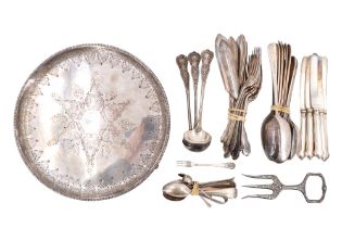 A quantity of silver-plated flatware, including 1920s Walker & Hall spoons, a Victorian bread