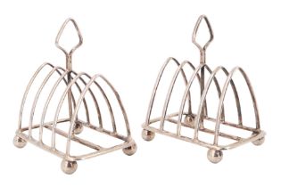 A pair of 1930s silver toast racks, Goldsmiths & Silversmiths Co Ltd, London, 1933 and 1934