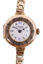 A George V 9 ct gold Charmion Lever wristlet watch, having a 15 jewel movement, Arabic numerals