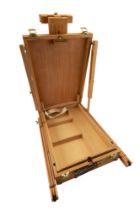 An artist's portable combined easel and painting materials case