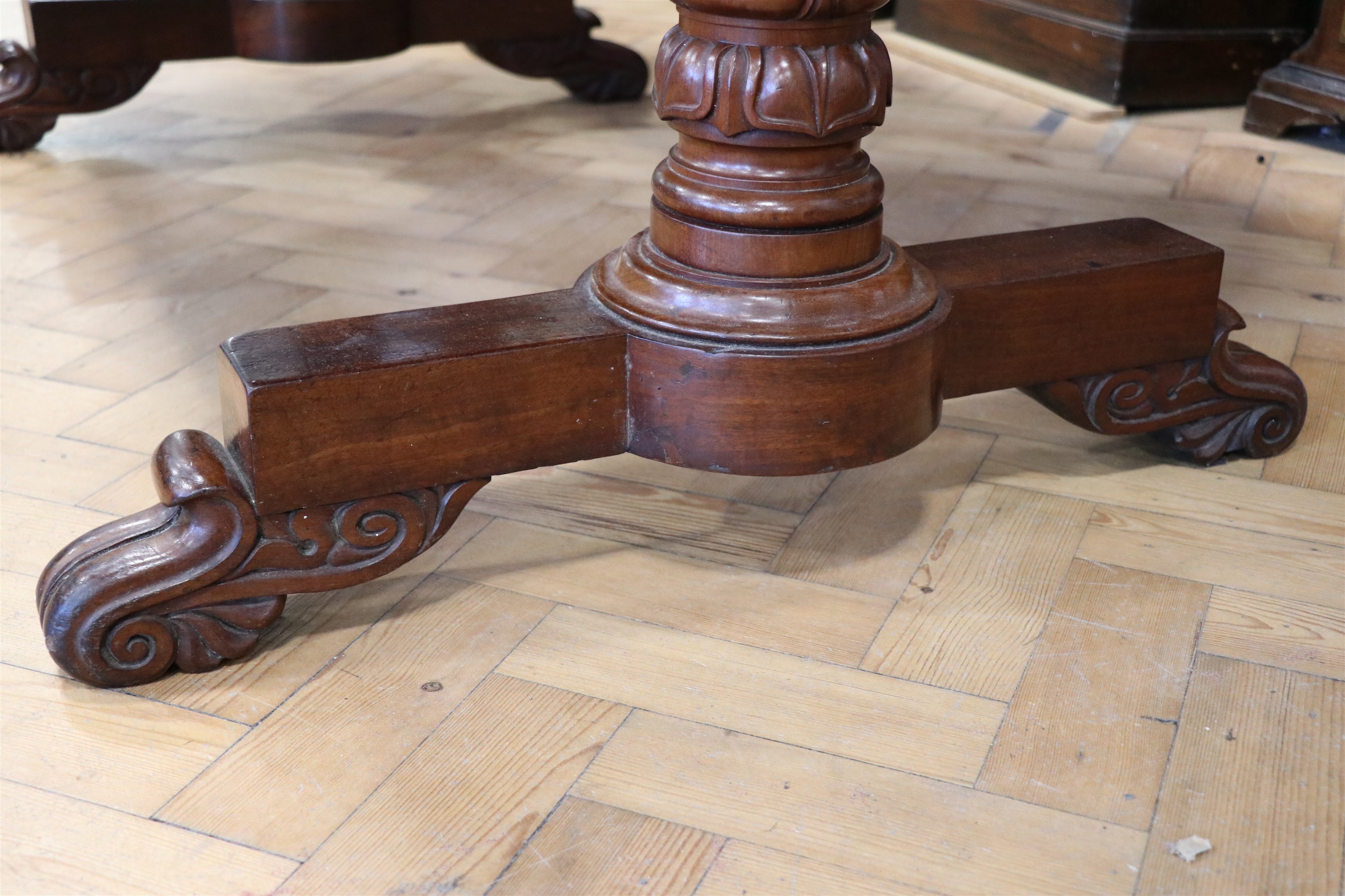 A Georgian mahogany writing table, having a rounded oblong top with a gilt tooled red leather - Image 4 of 4