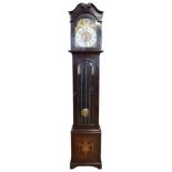 An Edwardian mahogany longcase clock, having a three train movement striking and chiming on 12 gongs