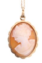 A cameo pendant in a 9 ct gold textured frame, London, 1988, on a fine yellow metal chain marked '