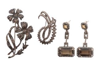 A group of vintage marcasite and white metal jewellery including a pair of striking Art Deco style
