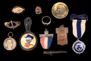 A Bruges sweetheart brooch in the form of a bayonet, together with military and other badges, etc