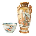 An early 20th Century Japanese Satsuma vase together with a tea bowl, former 15.5 cm