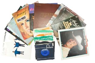 A quantity of vinyl records including albums and singles by The Beatles, The Who, The Yard Birds,