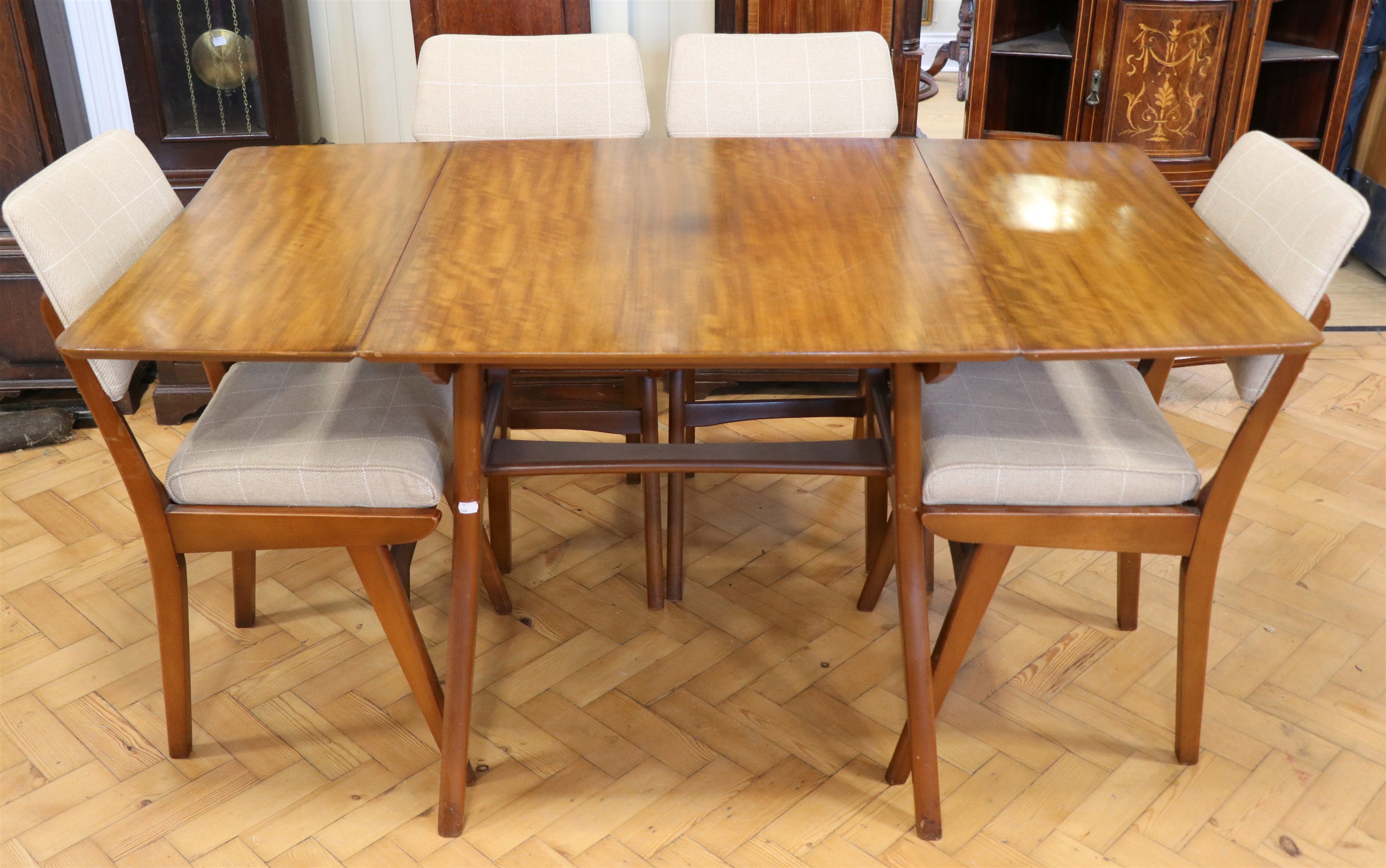 A teak and walnut dining suite, 1960s