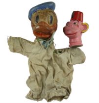 An early 20th Century Disney Donald Duck puppet, having a rubber head and cloth body, together