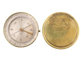 A late 19th / early 20th Century French brass pocket magnetic compass, 64 mm