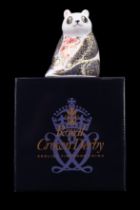 A Royal Crown Derby panda paperweight, having a gold stopper and boxed, 11 cm